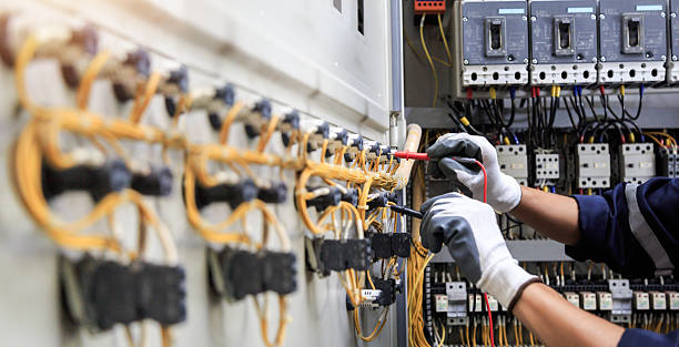 Professional Electrician technician working in Acushnet Center, MA